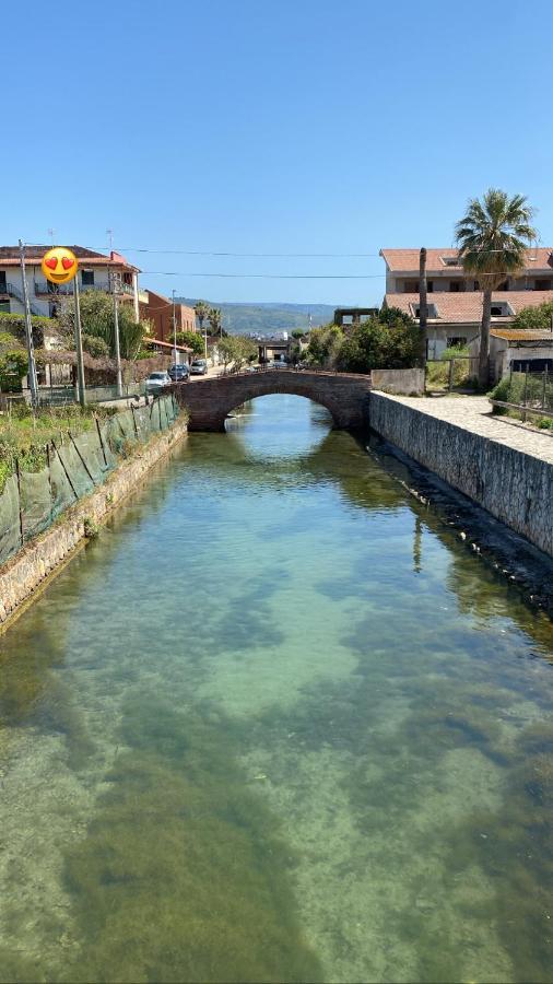 Tra Mare E Lago Torre di Faro Extérieur photo